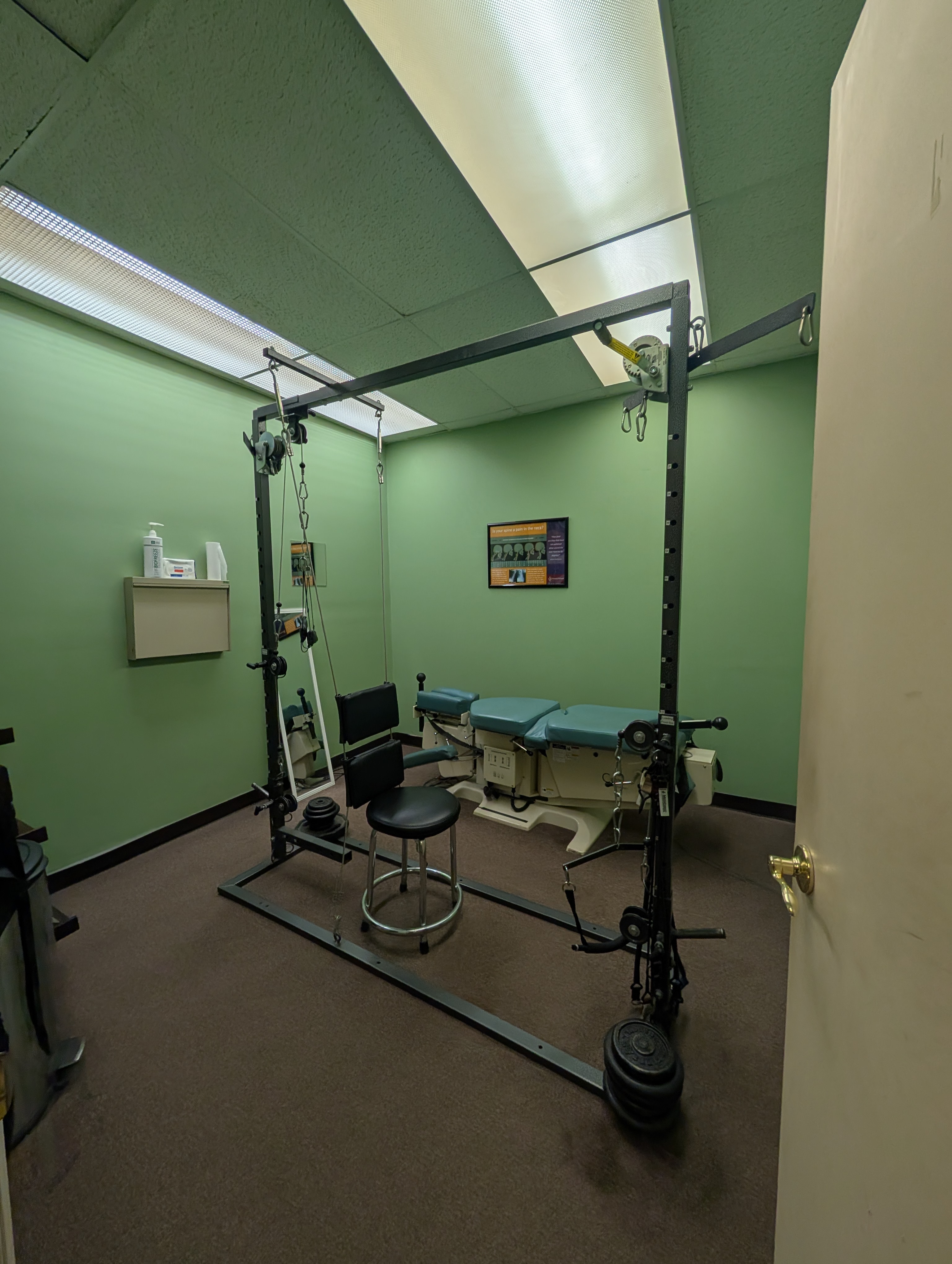 The CBP - Chiro Bio Physics room is shown at Gowanda NY office. This involves using weights and traction to adjust the spinal curve of the spine.